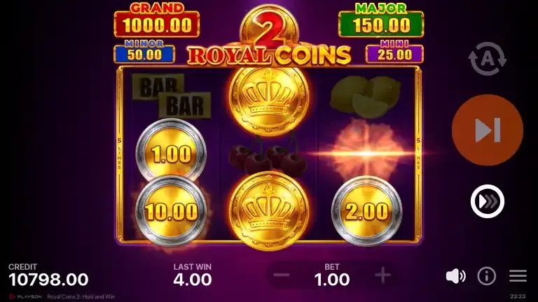 Royal Coins 2: Hold and Win board as the Pile of Gold feature adds symbols, with a second crown at the foot of the middle reel, coins of 1.00, 10.00 and 2.00 on the outer reels and a fourth coin landing on the right, balance 10,798.00